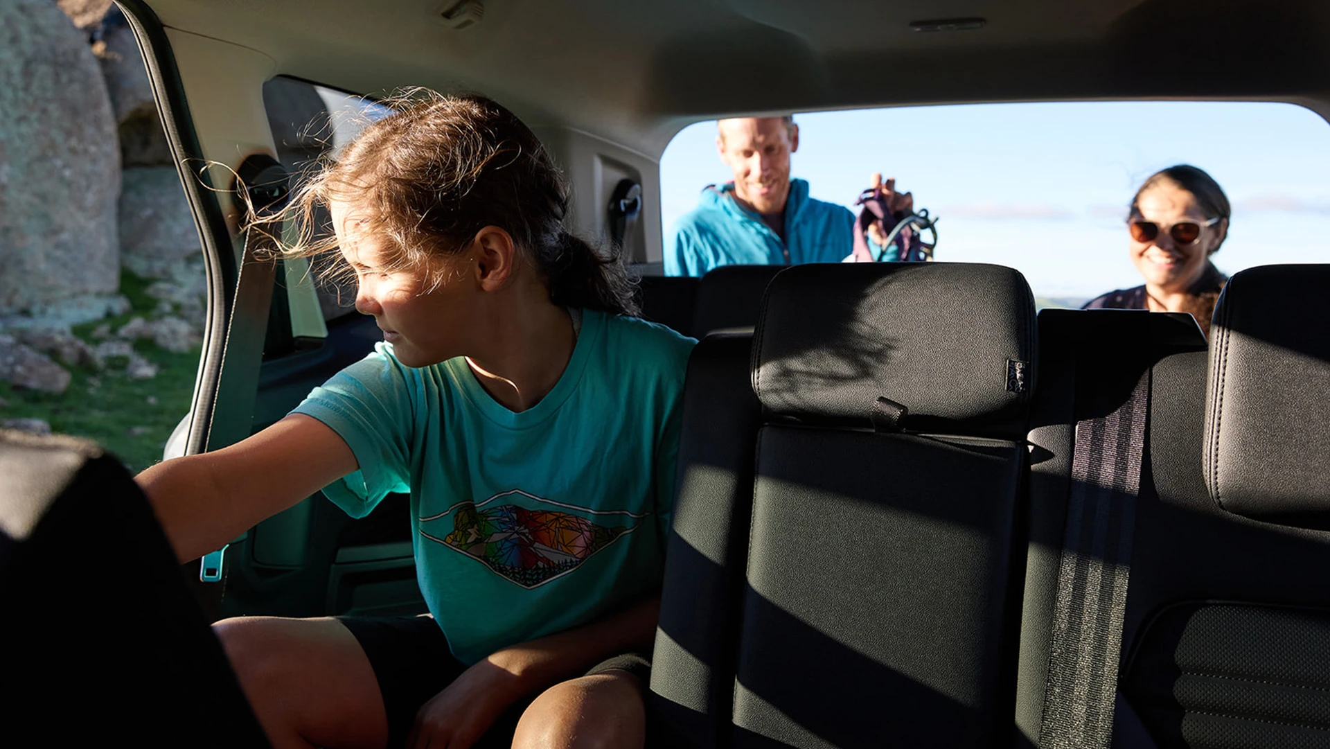 Family inside rear SUV seating