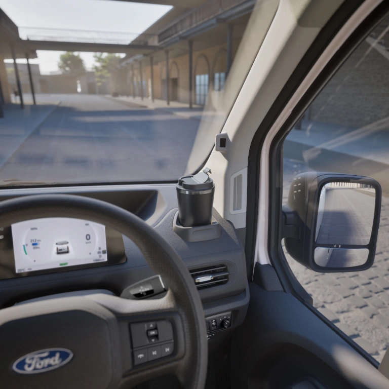 Driver seat view with mug
