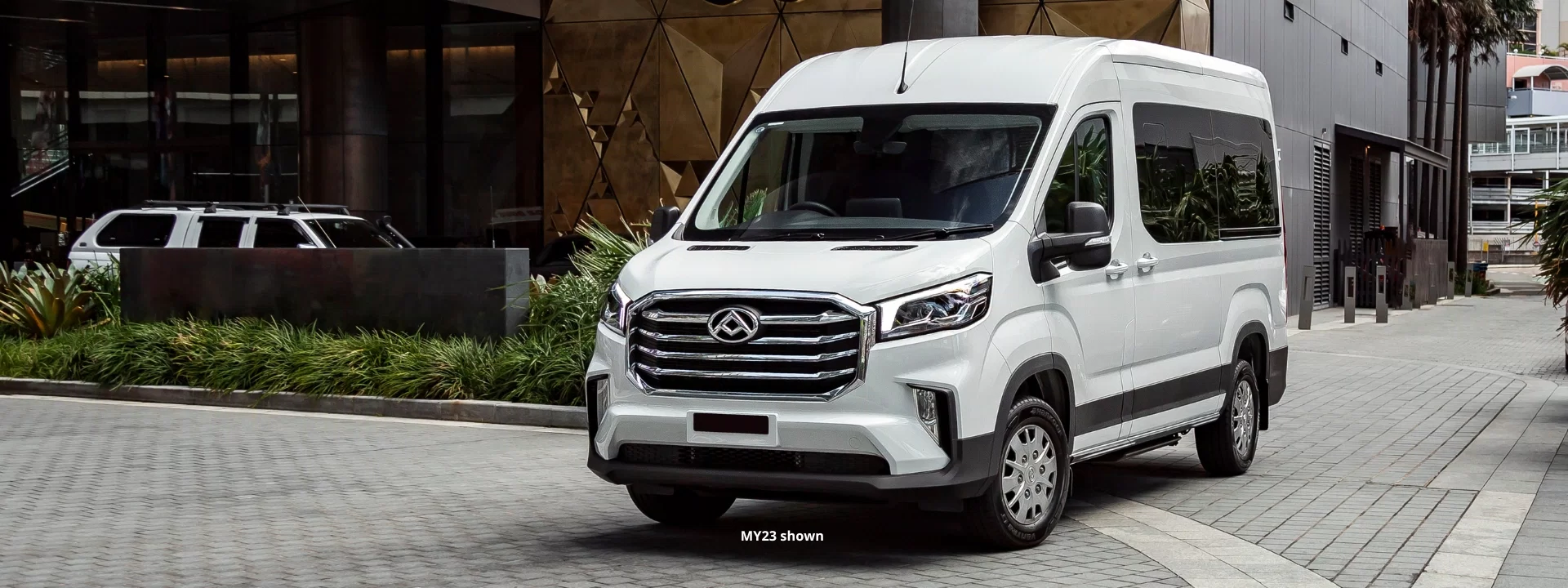 White LDV Deliver 9 Bus parked in the city