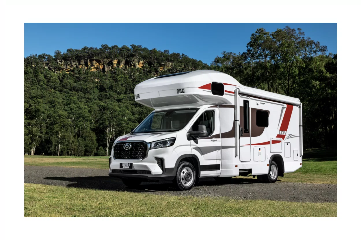 LDV Deliver 9 Motorhome exterior front three-quarter view parked on grass with Australian bushland backdrop