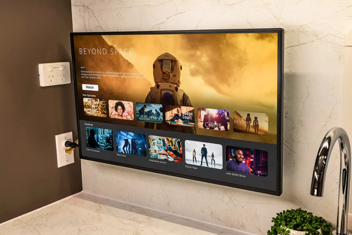 LDV Deliver 9 Motorhome interior with wall-mounted 32-inch Smart TV for in-cabin entertainment