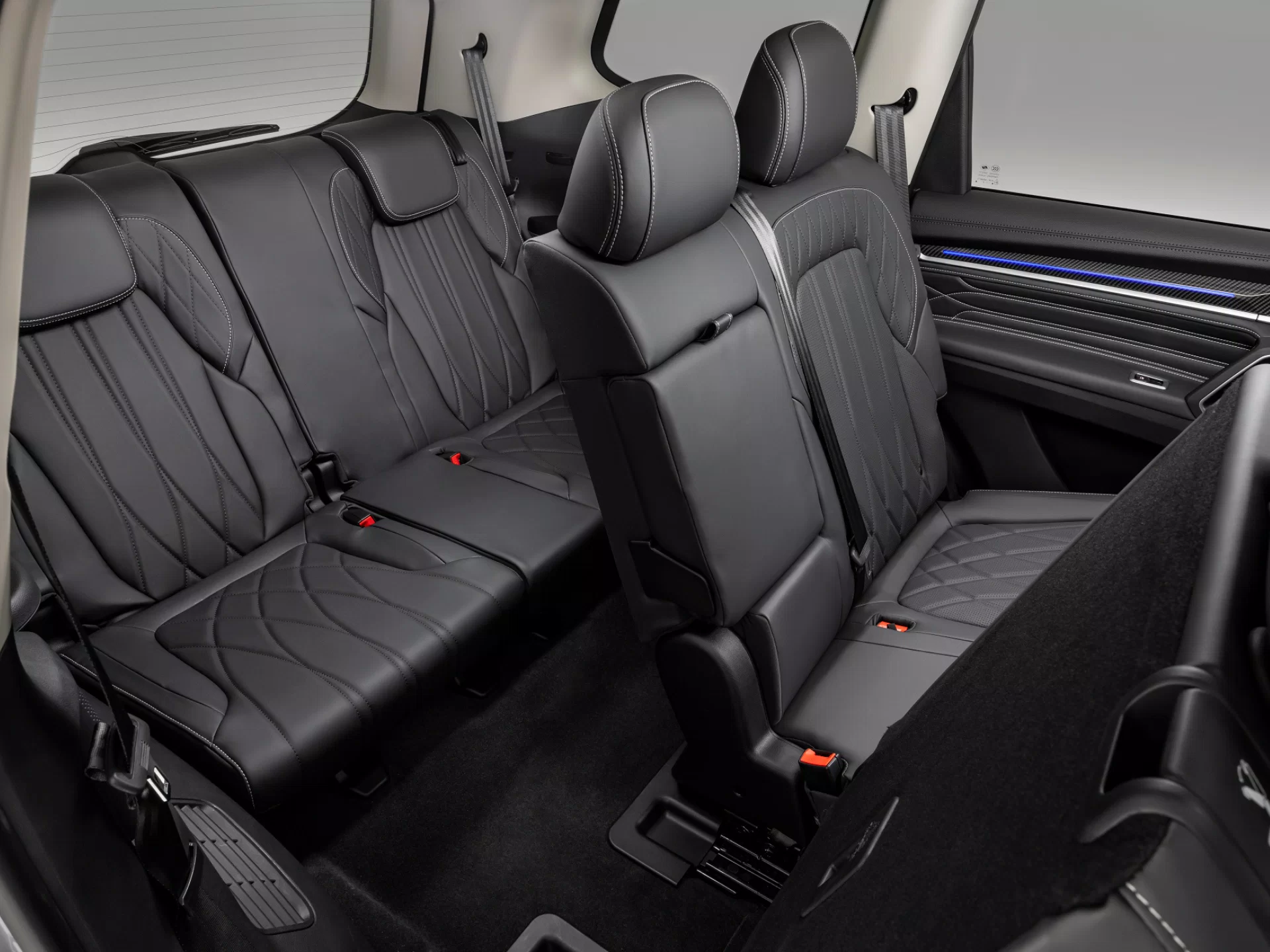 Easy spacious access to the third row inside the new D90 SUV