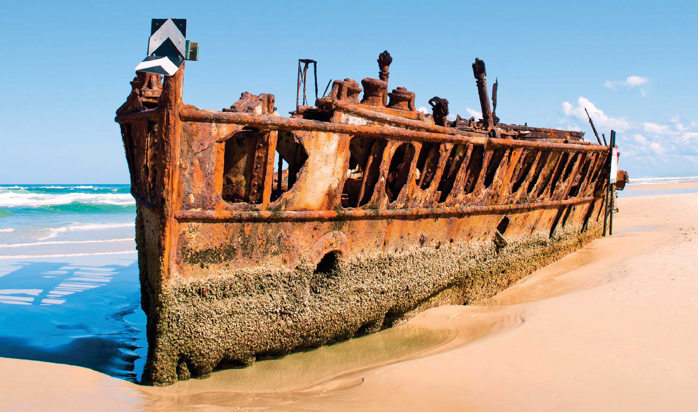 Rusted wreck on beach Fraser Island 