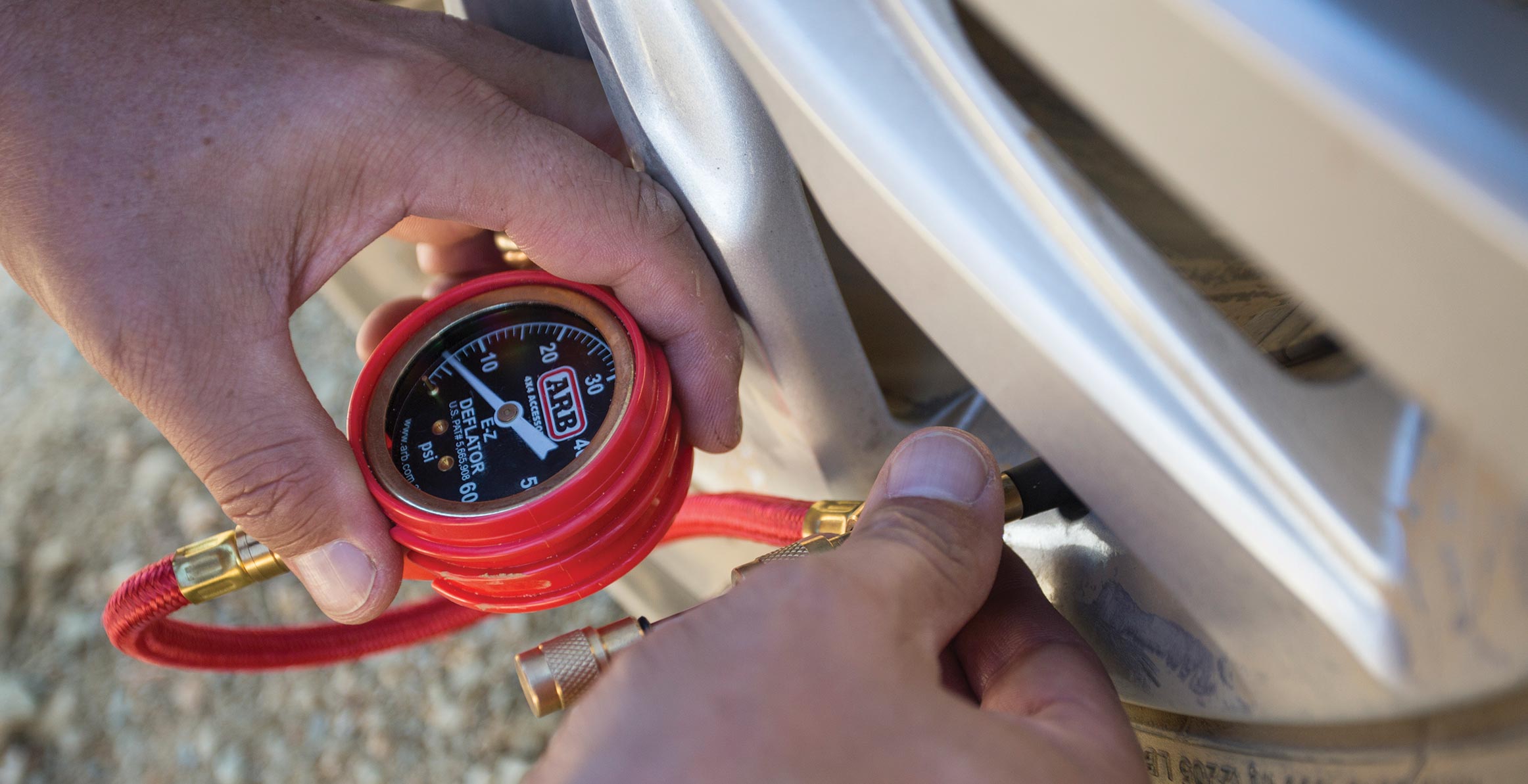 Pressure gauge attached to tyre 