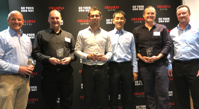 Jake Quick, Peter Carter and Greg Ward pose with their IUA National Skills Contest trophies
