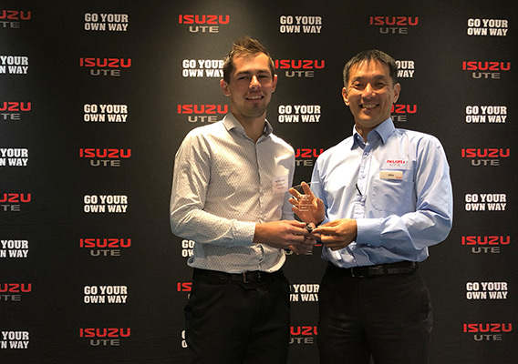 Competition winner Jack Quick and IUA Managing Director Hiro Kuramoto pose with trophy 