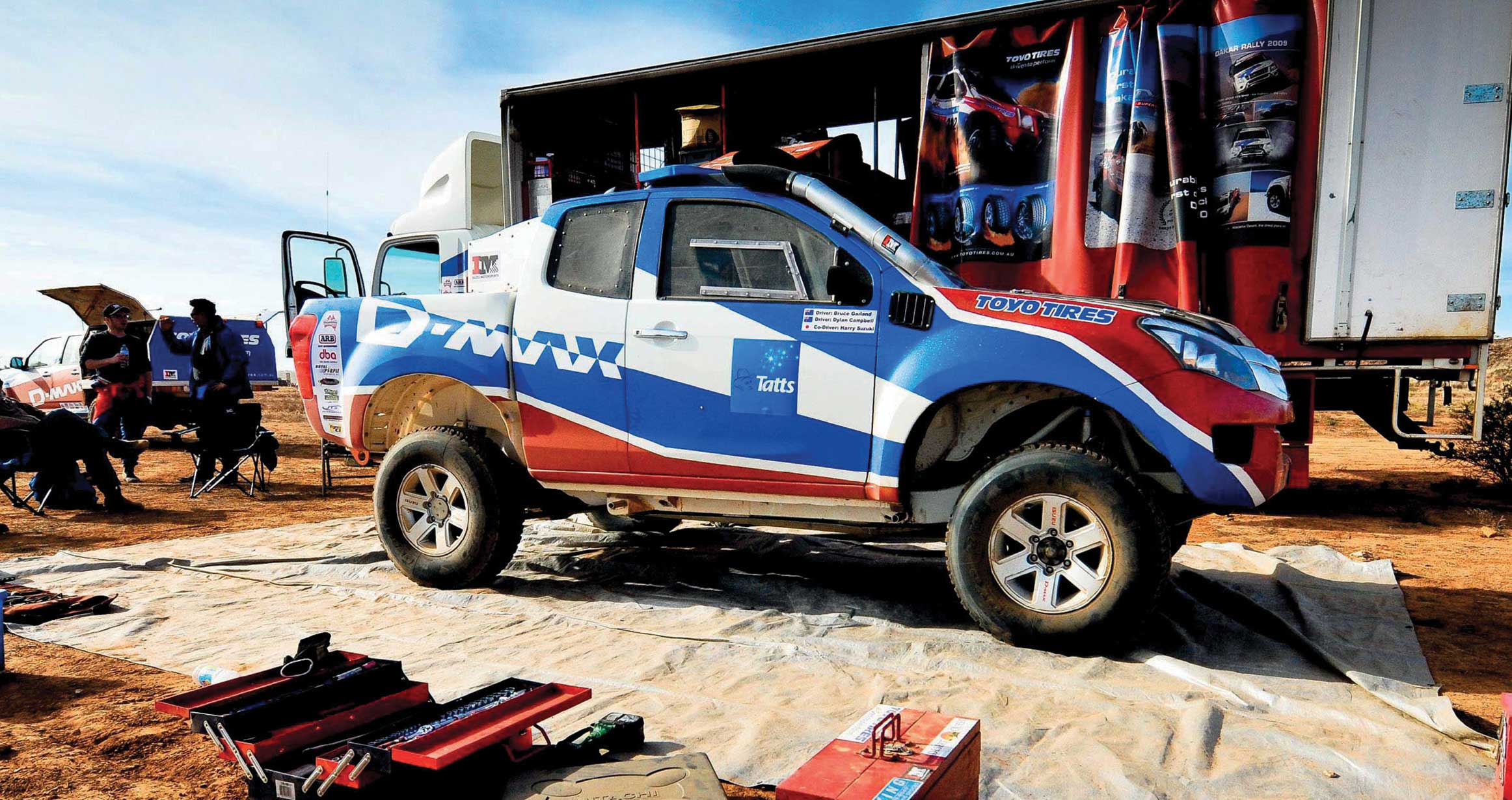Garland's D-MAX parked next to its transport truck