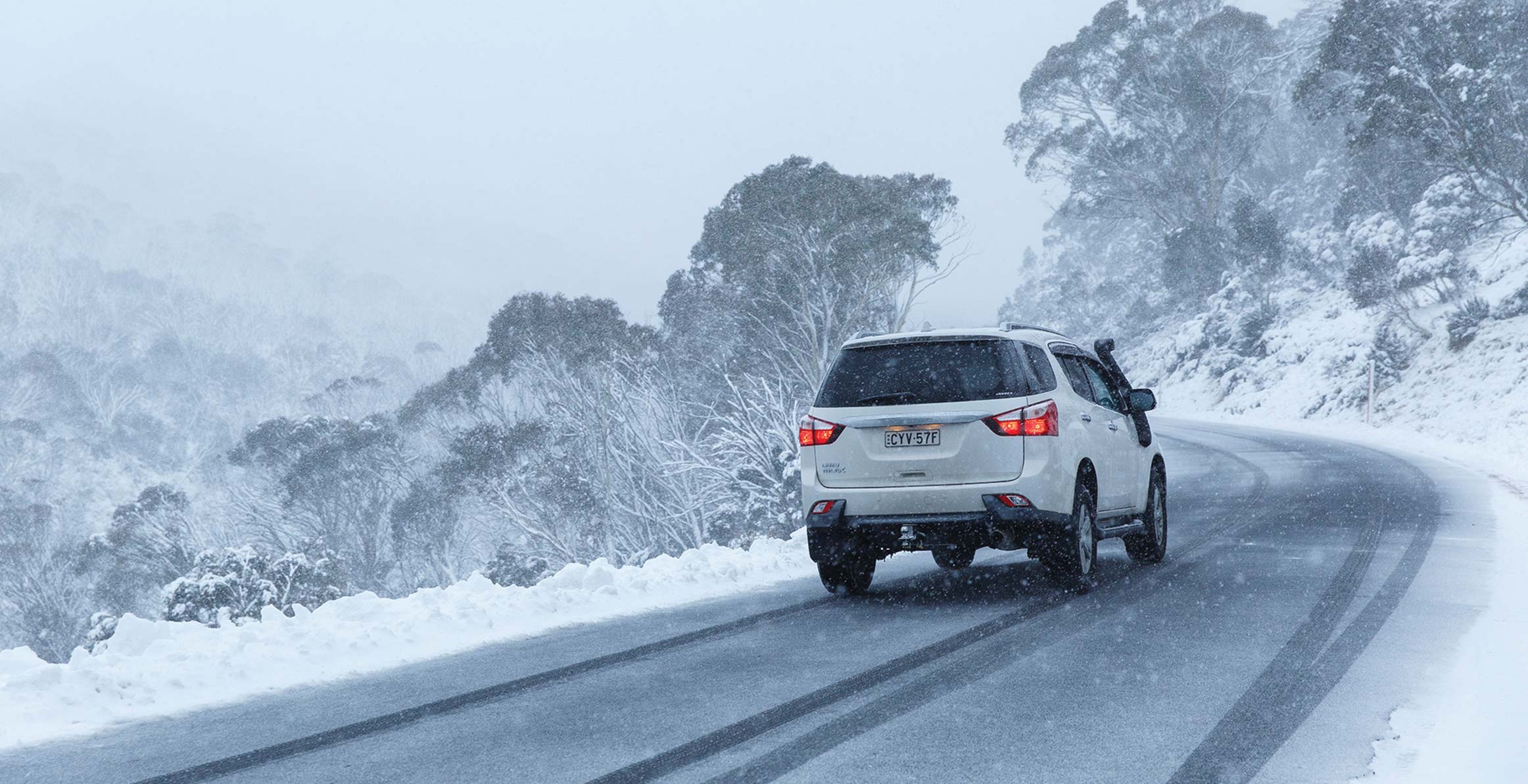 Rear shot of MU-X on snowy road