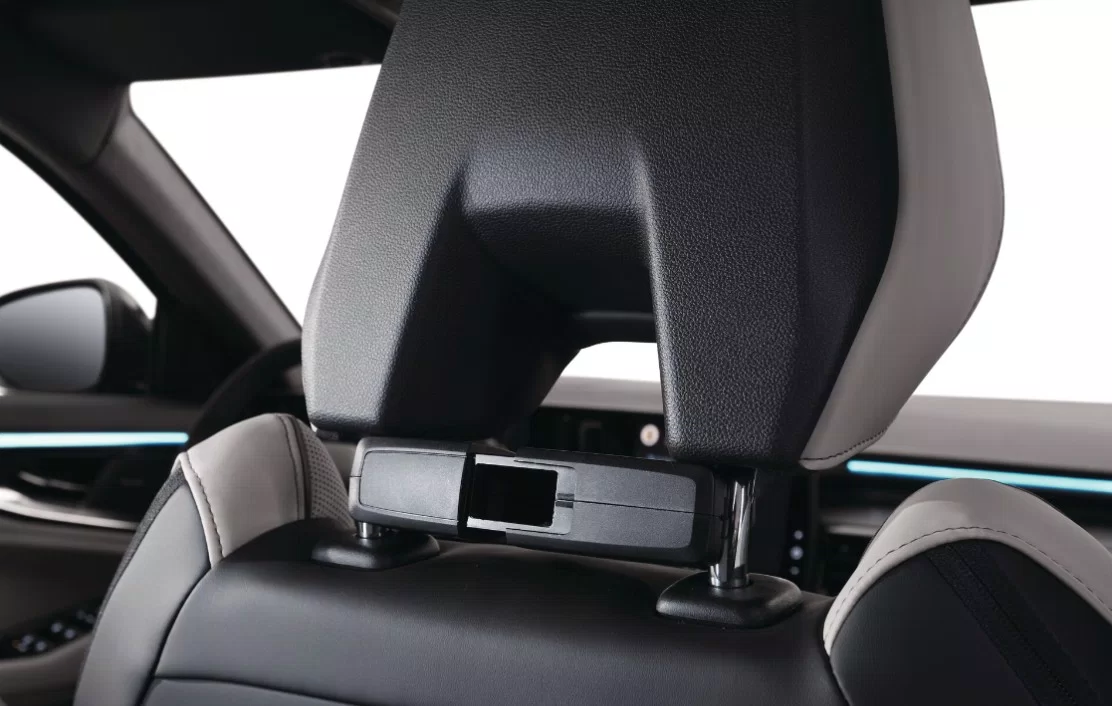 Multifunction holder on headrest