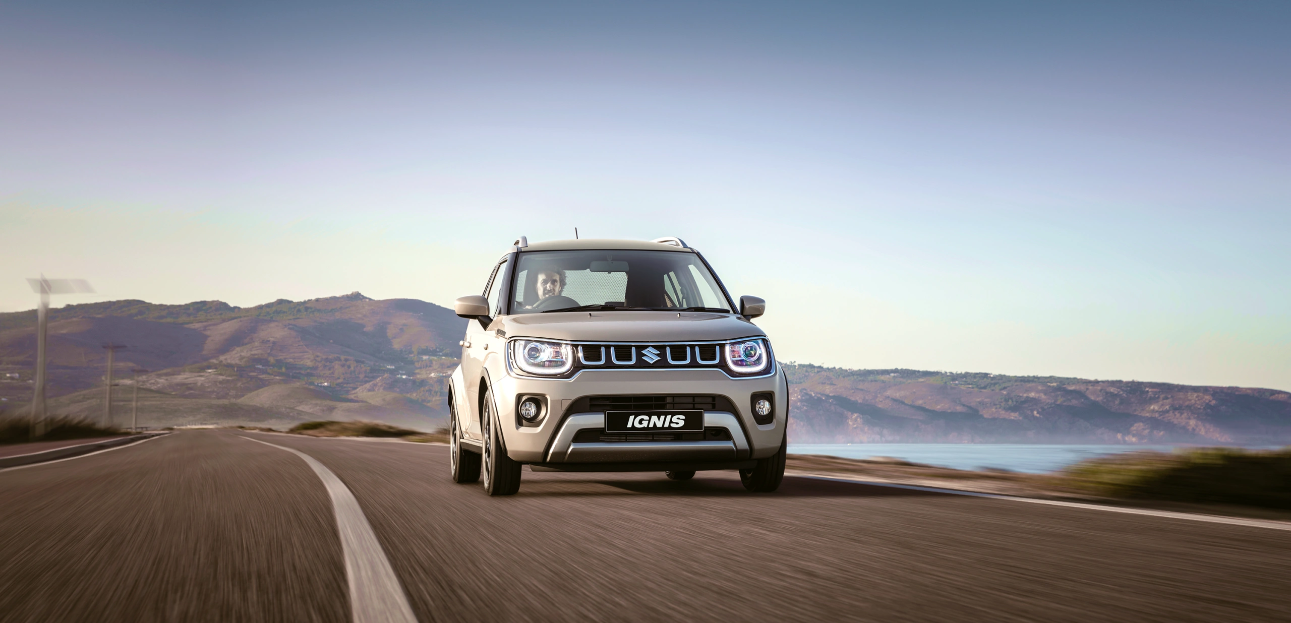 Suzuki Ignis on country road