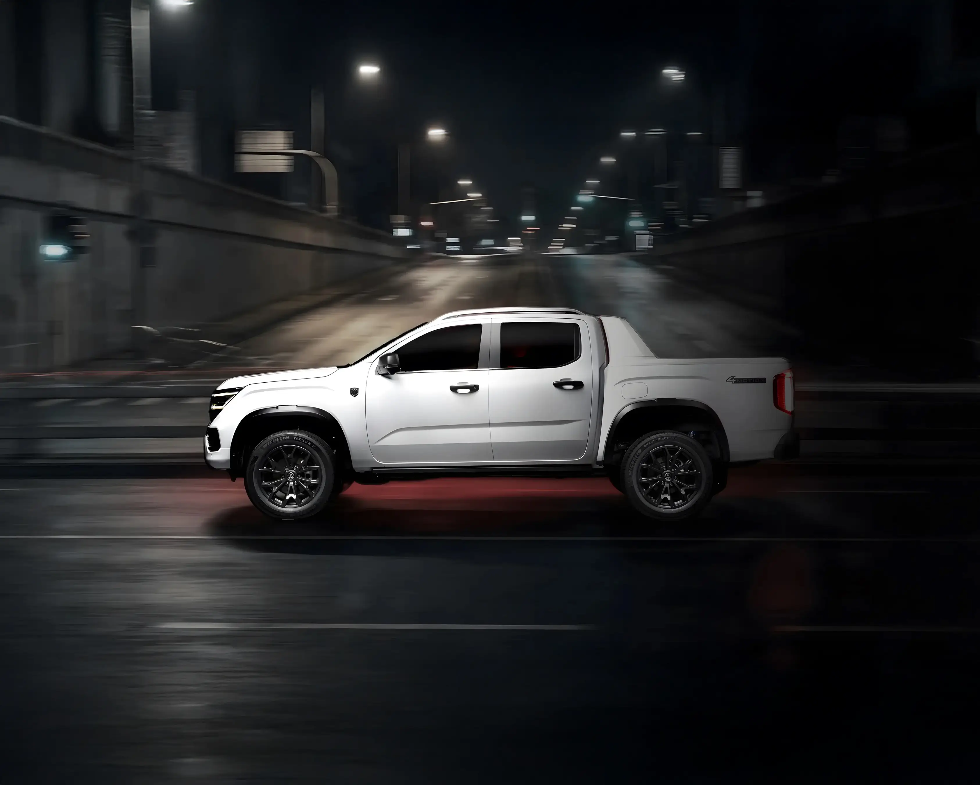 Amarok Walkinshaw at speed, city street at night