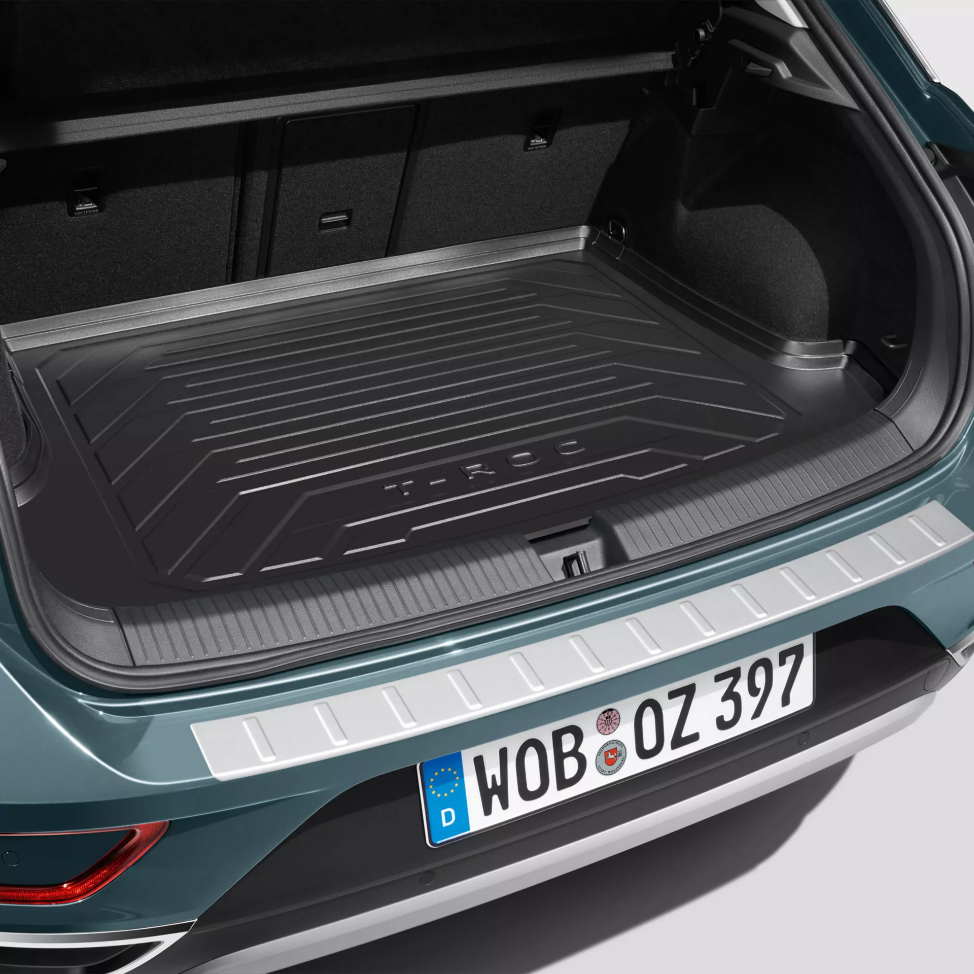 Helmet and shoes on a VW Accessories luggage compartment insert