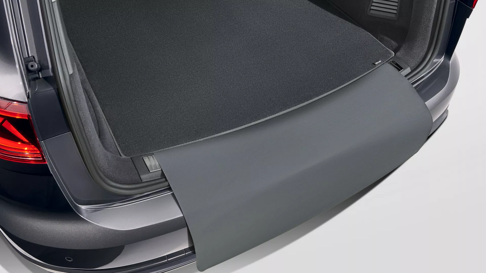VW Accessories reversible luggage compartment mat in luggage compartment of VW Touareg